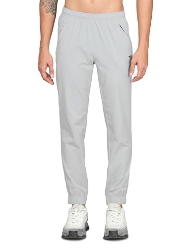 Image of TECHNOSPORT Men Mid Rise Regular Fit Solid Stretchable Joggers, Techno Dry for Regular Use and Sports