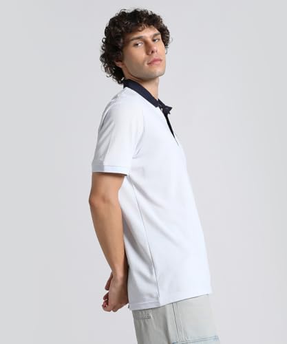Image of Puma Men Cotton Solid Regular Fit Polo T-Shirt for Both Sporty Outings and Casual Daywear