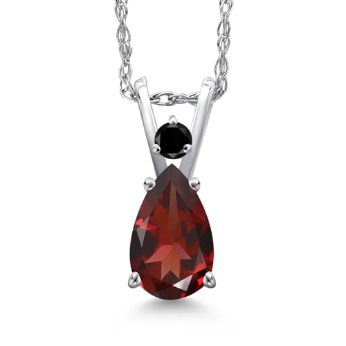 Pear-shaped pendant with black diamonds and garnet