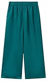 Pantalon ample en lin avec taille élastique et fronceur sur toute la taille. Longueur cheville et poches de couture.