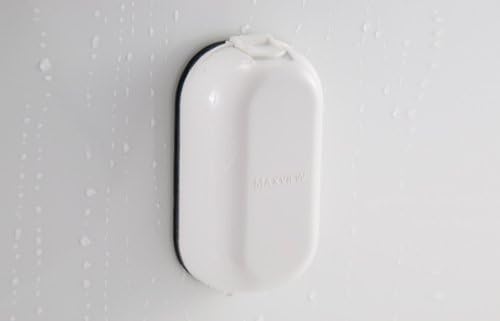 Maksview B2013 socket with the lid closed, showing its weatherproof design on a surface with water droplets.