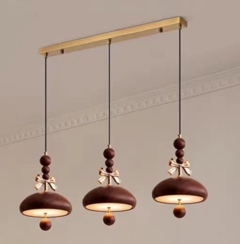Suspension longue 3 lampes pour éclairer une grande table de salle à manger
