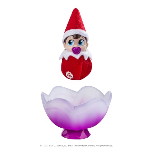 Image of The Elf on the Shelf Frost Pips Mini Blooms Elf Baby Girl with Blue Eyes | Includes a Frost Pips Elf Baby Girl with blue eyes and Frost Flower Cradle.