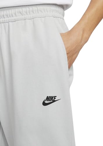 Image of Nike Men's Regular Fit Mid Rise Track Pant
