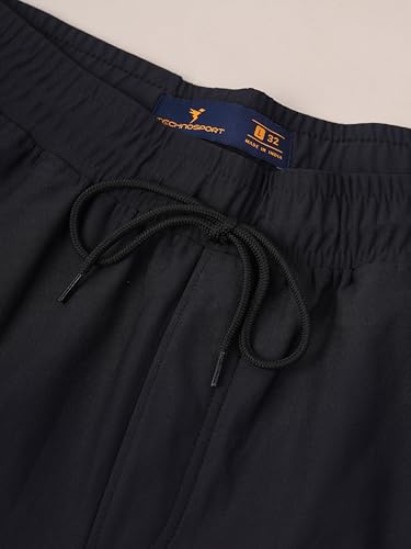 Image of TECHNOSPORT Men's Solid Relaxed Fit Joggers ELASTOPLUS 4-Way Stretch Polyester Quick Dry Mid Rise Drawstring with Zip Pockets for Gym Running
