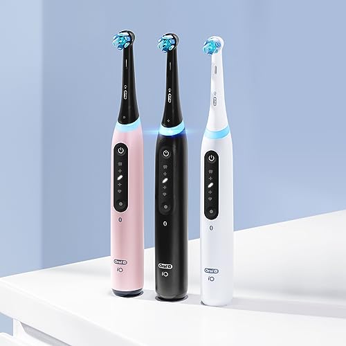 Image of Oral-B Rechargeable Electric Toothbrush, iO5 Limited Deep Clean & Whiten, 5 Cleaning Modes, Visual Pressure Sensor to Protect Gums, Travel Case, 3 Brush Heads, White
