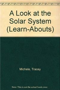 Paperback A Look at Our Solar System Book