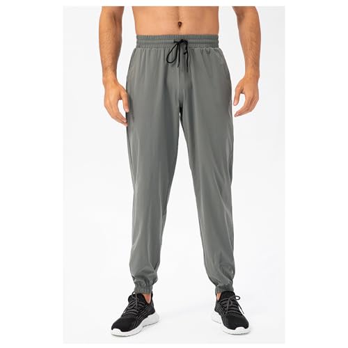 Men's Breathable Basic Stretch Workout Pants Loose Fit Elastic Waist Solid Pants Comfort Tapered Athletic Trousers3