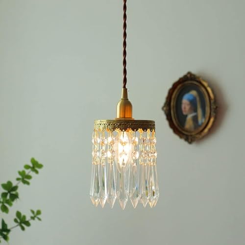Lámpara de cristal dorada regulable para iluminar tu mesa de comedor 2