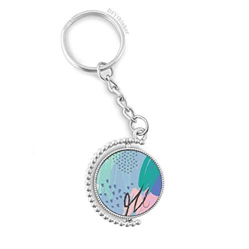 Llavero giratorio de plantas con anillo Pilgrim y diseño de extracto artístico