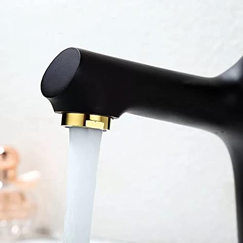 Robinet de lavabo noir et or pour rénover une salle de bain moderne