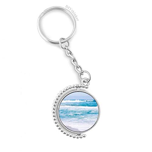 Llavero giratorio de océano y playa, el detalle perfecto para viajeros