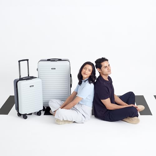 Image of Assembly Trolley Bags Set of 2- Cabin Small + Check-in Large with Laptop Pocket & 8 Spinner Wheels, Polycarbonate Hard Shell Trolley Bag Set for Business Travel & Vacations, Blue-White, 20+28 Inch