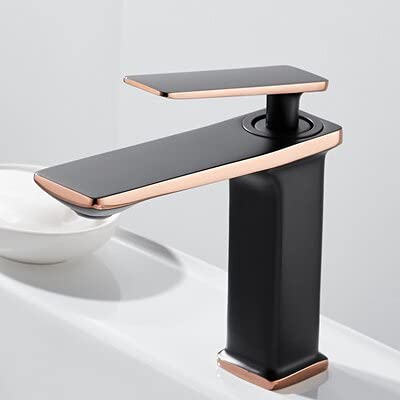 Grifo mezclador dorado para renovar el lavabo de tu baño actual