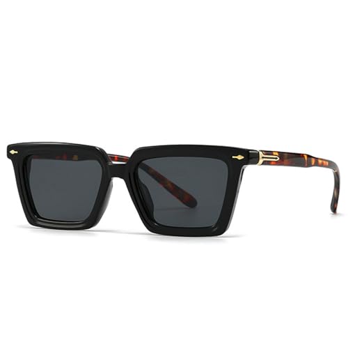 Lunettes de soleil œil de chat rétro dotées de rivets décoratifs et de verres verts dégradés