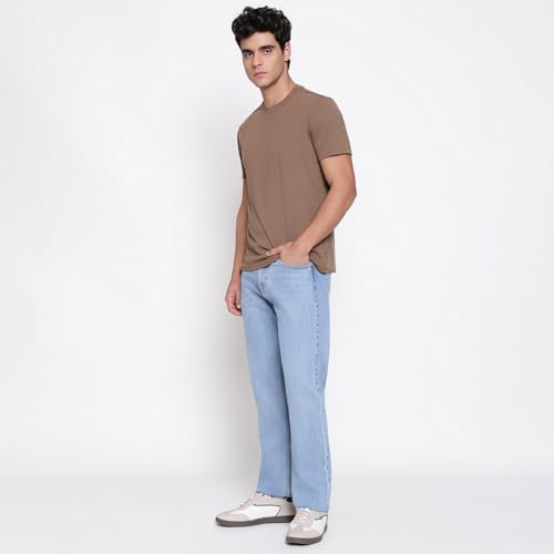 Image of GUESS Men Rodeo in Light Solid Relaxed Fit Denim Jeans