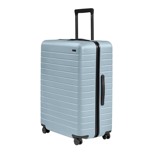 Image of Away Amazon Exclusive Large Checked Luggage - 29-Inch Lightweight Hardside Suitcase with Four WhisperGlide 360 Spinner Wheels, Interior Compression System, TSA-Accepted Lock - Sky Blue