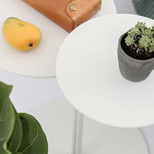 Table basse ronde blanche compacte pour optimiser les petits salons