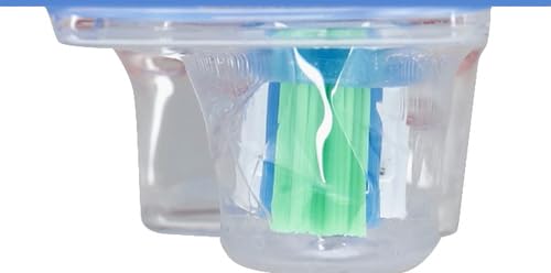 Close-up view of the Colgate Max White toothbrush head, showing the bristle pattern and polishing star.