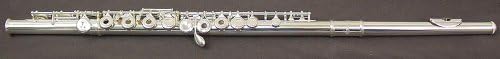 Fully assembled silver flute on a dark background.
