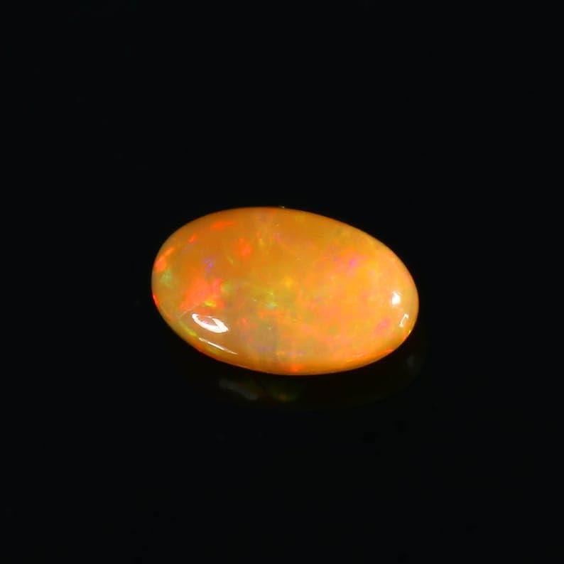 Opale éthiopienne Welo AAA | Cabochon ovale naturel multi-fire d'exception