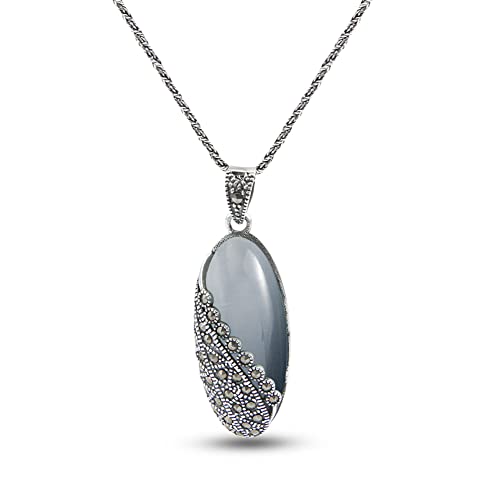 Jade Angel Plata de Ley con Moon Cuarzo y Marcasite Collar con colgante de piedras de Pirita Thail Joyero Vintage Cover