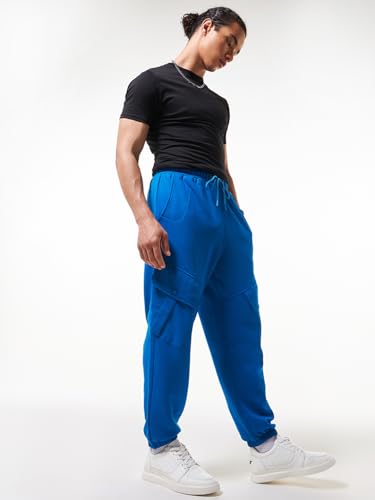 Image of Bewakoof Men's Fleece Super Loose Fit Joggers|Bewakoof Heavy Duty 1.0 | Track pants for man | Lower for man | Trouser for men | Baggy trackpants for men | Multipurpose | Mens Lower Activewear | Utility Pockets | Lightweight & Flexible Elastic Waist | Casual Joggers | Loose Fit
