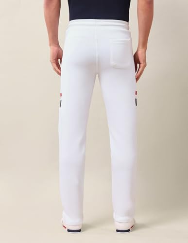 Image of U.S. Polo Assn. Men's White Solid Mid Rise Cotton Drawstring Slim Fit Flat Front Slit Pocket Track Pants