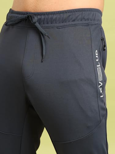 Image of TECHNOSPORT Mens Regular Fit Solid Woven Track Pant for Activewear, Regular Use and Quick Dry, (Non- Stretchable)