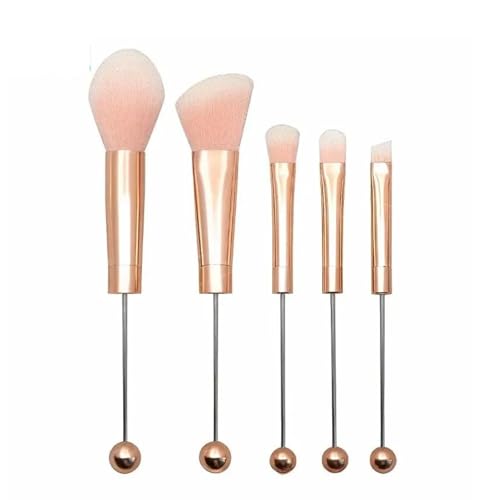 Pinceaux de maquillage rose doré pour vos retouches rapides