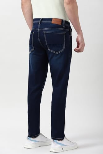 Image of Peter England Men's Slim Tapered Jeans | Denim Mid Wash | Casual Wear | Modern Fit