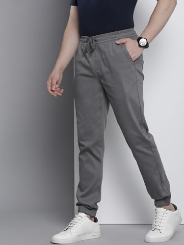 Image of The Indian Garage Co Men Slim Fit Solid Mid-Rise Stretchable Chino Joggers
