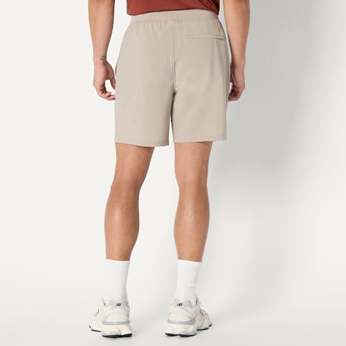 Image of Amazon Essentials Men's Athletic Running Training Shorts, Performance Stretch Woven Workout Shorts, 7 inch