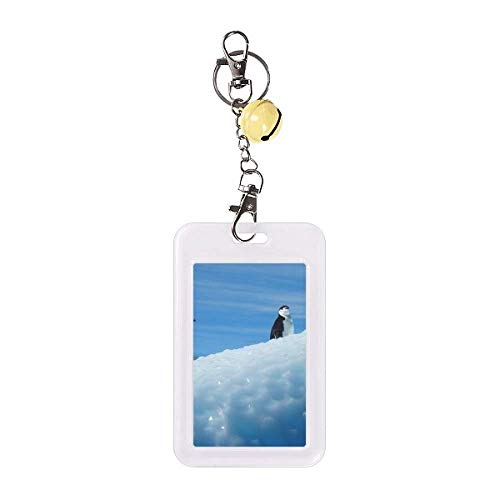 Funda de tarjeta de crédito que protege tus plásticos con diseño de pingüinos antárticos y campana.