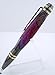 Handmade Professional style ballpoint pen. Pieces of Detroit fordite agate or motor agate layered paint and pink and gold acrylic. Gold and gunmetal trim. Black ink.