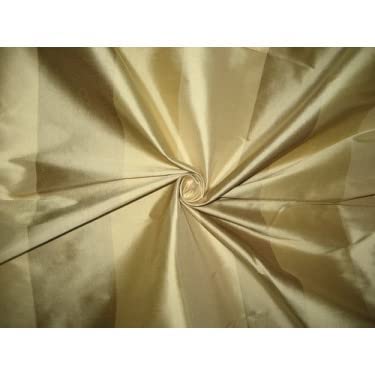 Tissu Dupioni en pure soie à rayures dorées idéal pour vos robes de soirée