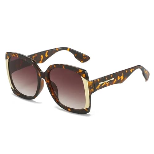 Lunettes de soleil de luxe avec monture oversize aux finitions haute couture