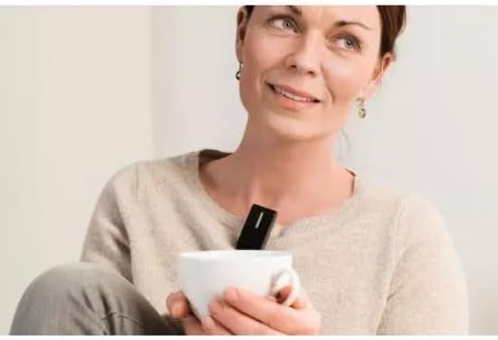 Person wearing Oticon ConnectClip