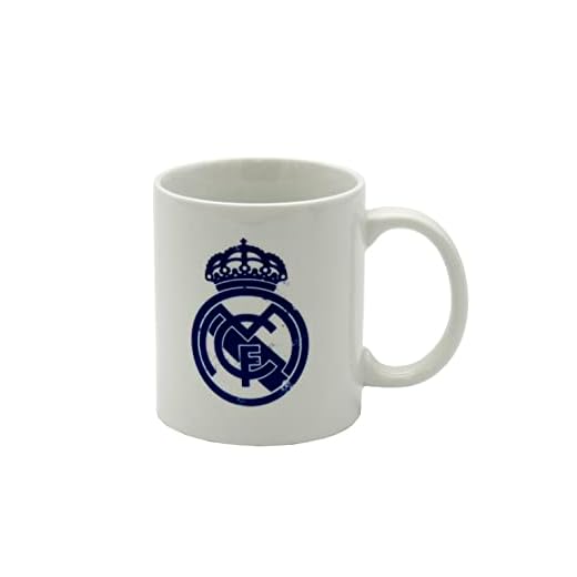 Real Madrid - Taza para Desayuno en Caja, de Cerámica, 300 ml, Color Blanco con Escudo en Azul , Producto Oficial (CyP Brands)