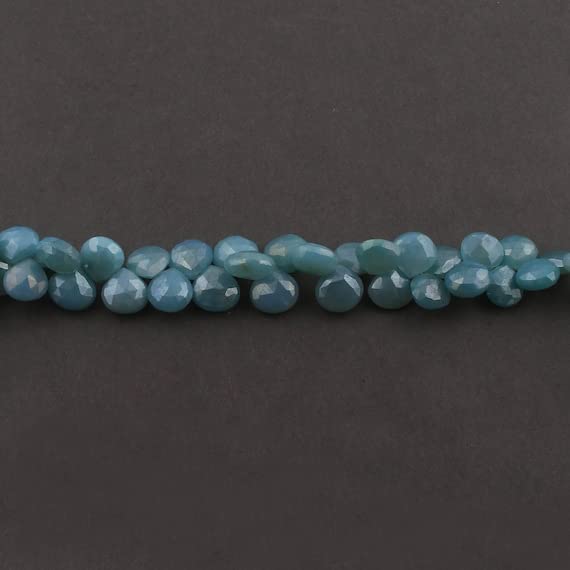 Perle de calcédoine bleu clair en cœur, l'éclat de la sérénité