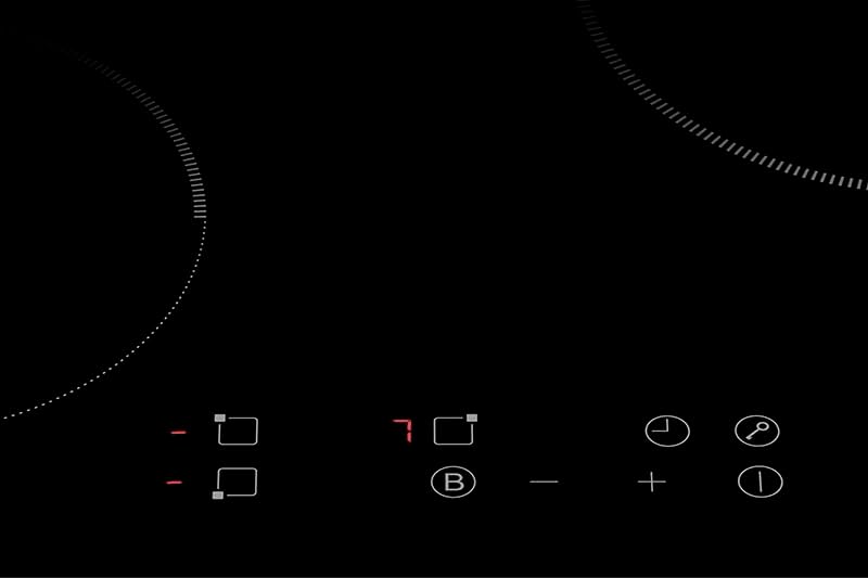 A închide view of the touch-sensitive control panel of the AMSTA AMPI3Z5000 Induction Hob, showing power, timer, and booster buttons.