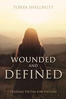Wounded and Defined: Trading Victim for Victory 0578877899 Book Cover