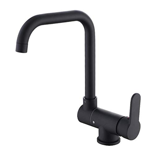 Mitigeur évier noir pliable pour cuisine lumineuse ouverte sur jardin