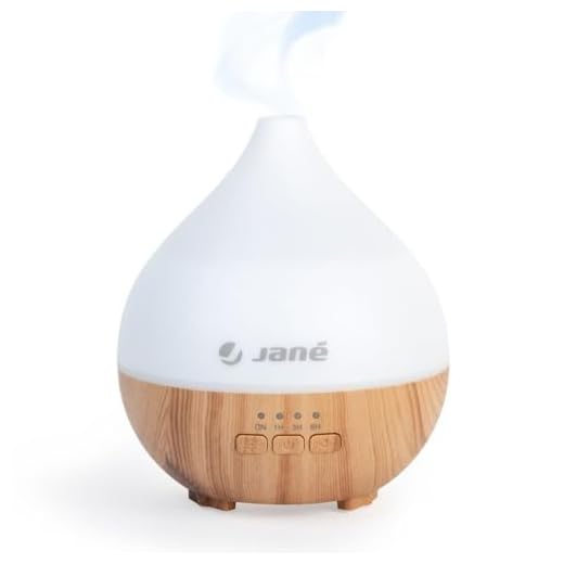Jané Humidificador Bebés, Ultra silencioso, Capacidad 140 ml, 7 Colores led, Apto para Esencias, Temporizador, Madera