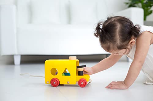 Image of PlanToys Sorting Bus Pull Toy - Sustainably Made from Rubberwood Featuring Organic-Pigment Coloring and Water-Based Dyes with 3 Colorful Shapes and Pull-Along Bus