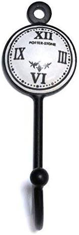 Pushka Home Small Potterstone Clock Face Black Metal Iron Coat Hook Hanger. Ideal for hanging scarves, coats, hats, bags and jewellery. Black and white decorative home accessory that will add a vintage look to your interior. An effortless way to transform any room and create a wall feature. The vintage style hook comes in a black iron metal base with a white ceramic porcelain front. Supplied with a screw.