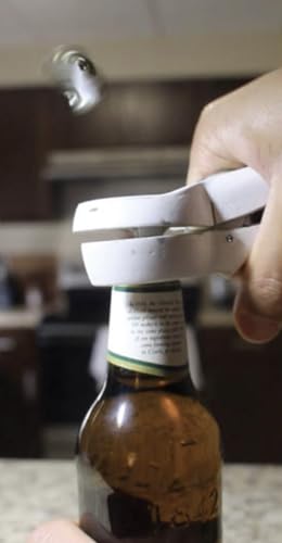 Décapsuleur lance-capsule noir pour ne plus jamais perdre vos bouchons de vue