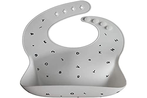 Image of mushie Silicone Baby Bib | Adjustable Fit Waterproof Bibs (Letters White)