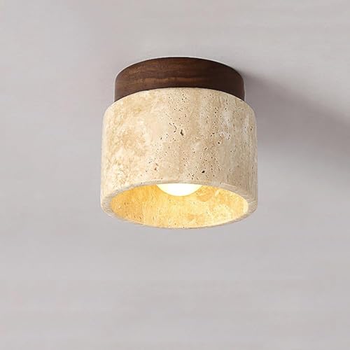 Luminaires Wabi Sabi en marbre jaune pour illuminer un hall d'entrée