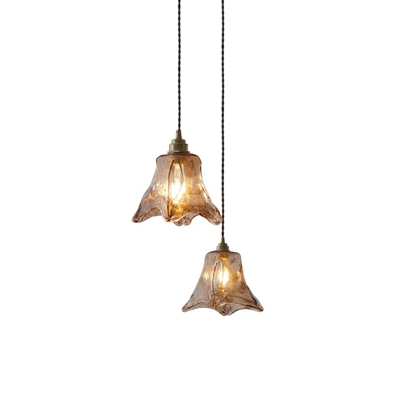 Lampe suspension réglable en laiton pour optimiser l'espace de chevet